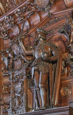 Photo for Bruges, Belgium - July 19, 2020:  Wooden sculpture of the Emperor family in the Alderman Hall of the Justice palace - Royalty Free Image