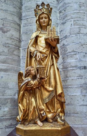 Photo for Brussels, Beigium - September 5, 2018: The golden statue of St. Gudule in the Saints Michael and Gudule Cathedral - Royalty Free Image
