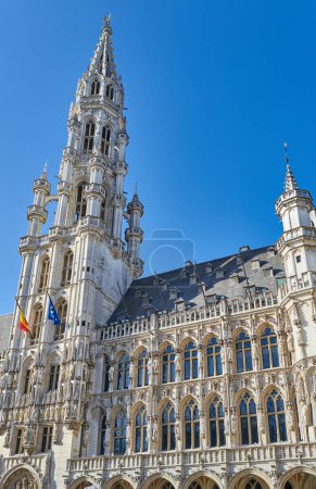 Photo for Brussels, Beigium, view of the tower of the town hall in the Grand place (Grote Markt) square - Royalty Free Image