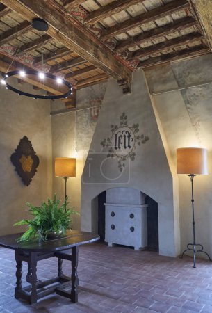 Photo for Manta, Itaky - October 14, 2018: The vestibule with fireplace of the sixteenth-century palace of  Valerano Saluzzo Della Manta known as Castello Della Manta - Royalty Free Image