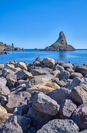 Photo for Aci Trezza, Italy, view of the stacks of the Cyclops marine  nature reserve - Royalty Free Image