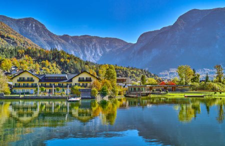 Photo for Hallstatt, Austria, view of the  Obertraun village on the Hallstatter see or Hallstatt lake with the Austrian Alps in the background - Royalty Free Image