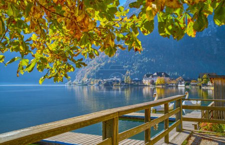 Photo for Hallstatt, Austria, view of the village on the Hallstatter see or Hallstatt lake with the boat docking area in the foreground - Royalty Free Image
