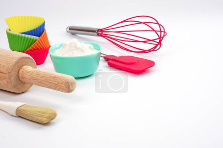 Photo for Top view set of kitchen utensils and ingredients for bakery on white background. Materials or kitchen equipment for bakery. - Royalty Free Image