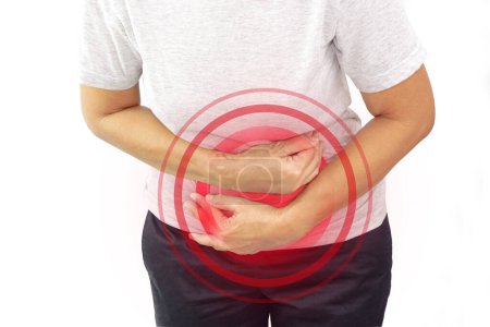 Asian woman suffering from stomachache with clipping path. Chronic gastritis, menstruation and health concept.