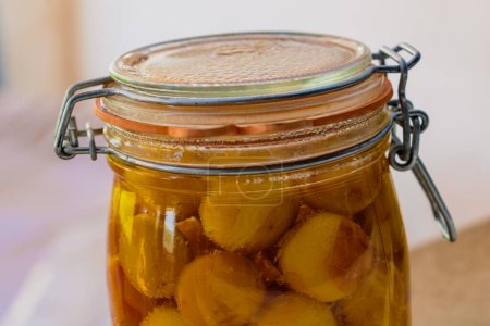 Sterilized mirabelle plums, homemade fruits in syrup for the winter, preserves nutrients