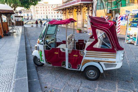 Photo for Syracuse, Sicily, Italy - November 21, 2022: A traditional three wheel taxi on the streets of Siracusa, Italy. - Royalty Free Image