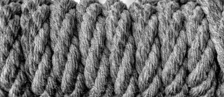 Photo for Reeled rope on the coil. The texture of a rope. Thick rope rolled into a roll. Background texture - Royalty Free Image