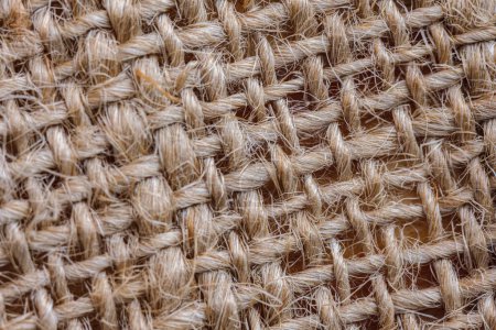 Photo for A macro detail photograph of sackcloth weaving. Suitable background for the handicrafts concept. - Royalty Free Image