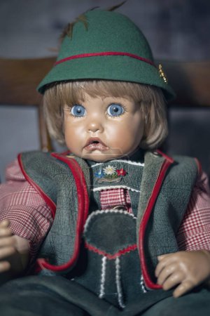 Photo for Porcelain antique doll in Bavarian clothes- close up - Royalty Free Image