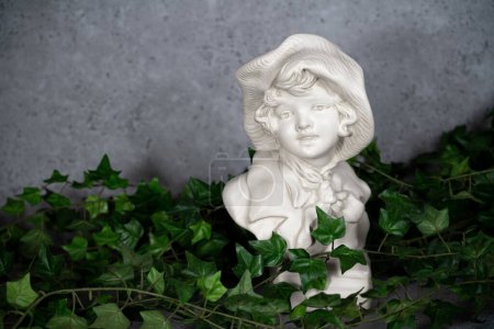Germany Stature Sculpted head, head carved from white stone, Girl with a antique hat.with green leaves
