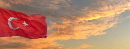 Photo for Turkish flag on cloudy sunset sky background header or banner with copy space. Happy National holiday of Turkey concept design. - Royalty Free Image