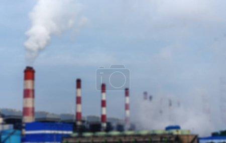 Photo for Blurred background Power stations electrical industrial plant. Blurry Electric power building refinery engineering steam smokestack. Defocused Lignite electricity chimney release pollution background - Royalty Free Image