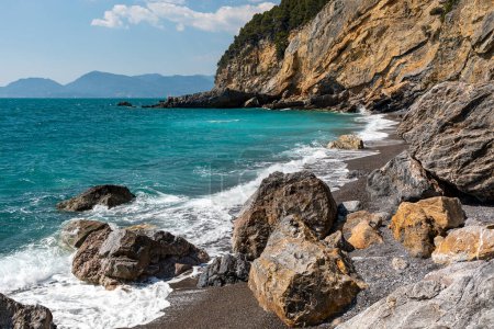Summer view of natural beach near Tellaro, Lerici, Liguria, Italy