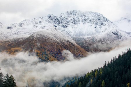 Photo for Amazing view over snow covered mountains with first snow in October. Near Davos, Switzerland - Royalty Free Image