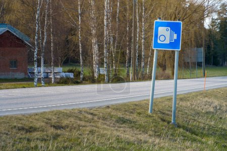 Photo for Blue speed camera traffic sign in countryside Finland. - Royalty Free Image