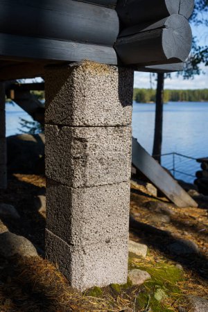 Photo for Concrete block pier foundation under a shed in nature, Finland. - Royalty Free Image