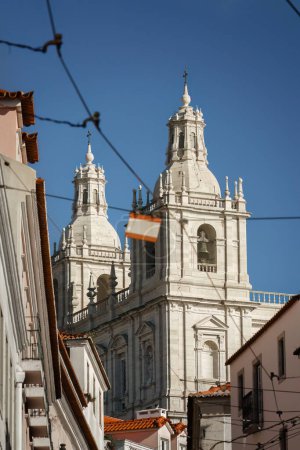 Photo for Twin towers of the Monastery of Sao Vicente De Fora seen from the street in Lisbon, Portugal - Royalty Free Image