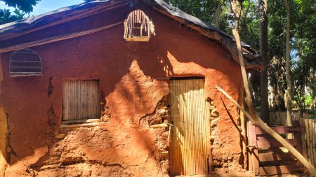 rustic house made of wood and clay