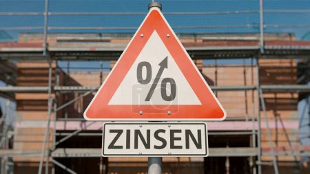 Info sign with the German word "Bauzinsen" (building interest rates) 