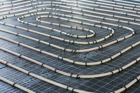 Photo for Pipes for underfloor heating in bifilar laying form - Royalty Free Image