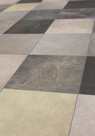 Various laid square floor tiles, portrait format