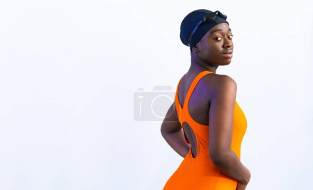 Photo for Portrait of a black young woman in swimsuit looking at camera, posing with plain white background - Royalty Free Image
