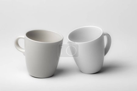 Photo for Mockup of a two different coffee cups, isolated, on a plain background, ready to overlay designs or logos for merchandising - Royalty Free Image