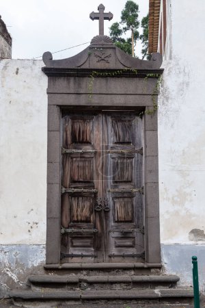 Photo for FUNCHAL, PORTUGAL - AUGUST 25, 2021: This is a preserved old doorway to the adjoining area from the street. - Royalty Free Image