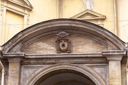 Photo for ROME, VATICAN - MARTH 9, 2023: This is a relief in the form of an ancient Greek theatrical mask that adorns one of the lunettes of a passage to the Octagonal Courtyard of the Vatican Museums. - Royalty Free Image