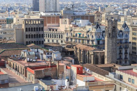 Photo for BARCELONA, SPAIN - MAY 10, 2017: This is an aerial view of the Royal Palace and the bell tower of the Santa Agata Chapel, hidden in the thick of old houses. - Royalty Free Image