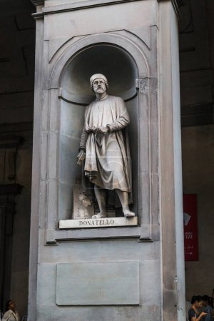 Photo for FLORENCE, ITALY - SEPTEMBER 18, 2018: This is statue of sculptor Donatello, one of the statues that adorn the building of the Uffizi Gallery. - Royalty Free Image