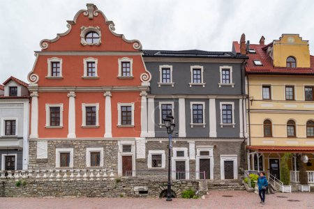 Photo for KAMENETS-PODOLSKY, UKRAINE - APRIL 26, 2023: These are the facades of historical houses surrounding the Polish Market Square. - Royalty Free Image