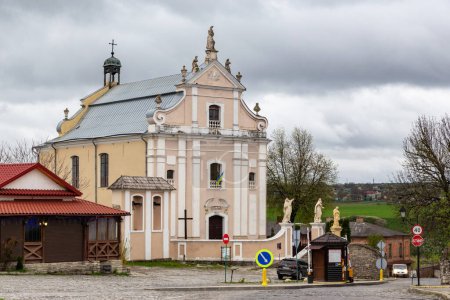 Photo for KAMENETS-PODOLSKY, UKRAINE - APRIL 26, 2023: This is the Baroque Catholic Church of St. Trinity Trinitarian monastery (18th century). - Royalty Free Image
