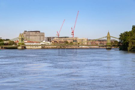 Photo for LONDON, GREAT BRITAIN - MAY 18, 2014: This is a view of Hammersmith Bridge over the Thames. - Royalty Free Image