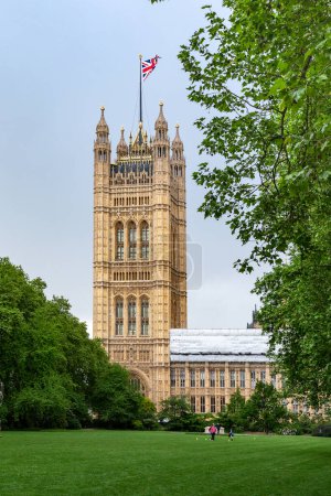 Photo for LONDON, GREAT BRITAIN - MAY 12, 2014: This is a view of the neo-Gothic Victoria Tower of the Palace of Westminster from Victoria Tower Gardens South. - Royalty Free Image