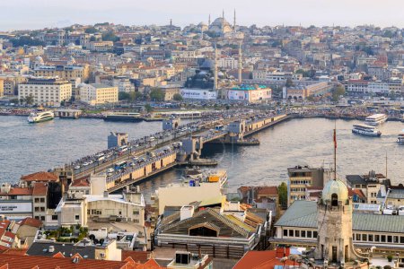 Photo for ISTABUL, TURKEY - SEPTEMBER 10, 2017: This is a view of the Galata Bridge from the height of the Galata Tower in the evening. - Royalty Free Image