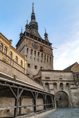 Photo for SIGHISOARA, ROMANIA - MAY 2, 2023: This is a passage to the gate of the Clock Tower of the medieval citadel. - Royalty Free Image