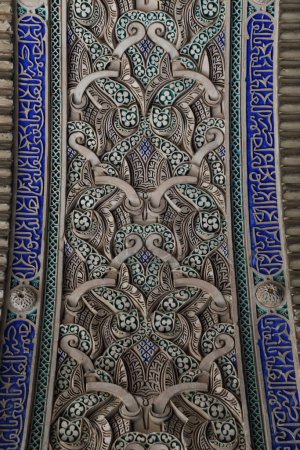 Photo for SEVILLE, SPAIN - MAY 21, 2017: This is an architectural fragment of the decoration of an arched doorway in the Moorish Palace in the Alcazar. - Royalty Free Image