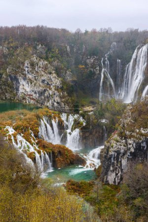Panoramic view of the beautiful Plitvice Lakes waterfalls in Plitvice National Park in Croatia. Travel photo. Vertical photo