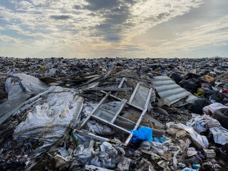 a lot of different garbage, at sunset-stock-photo