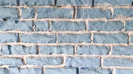 Téléchargez les photos : Texture de brique ancienne, peinte en bleu, avec coulis blanc - en image libre de droit