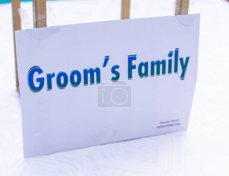 Photo for A name card with description Groom's Family, placed on a table in a wedding event to distinguish space of invited guest in Nigeria - Royalty Free Image
