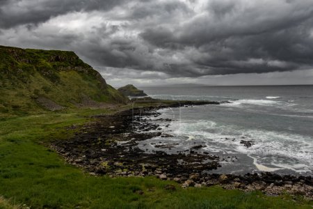 Photo for Giants Causeway, Northern Ireland under dramatic sky. - Royalty Free Image