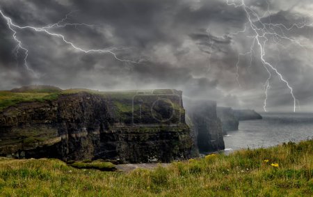Photo for Spectacular Lightning storm in Cliffs of Moher. Ireland's Coast - Royalty Free Image