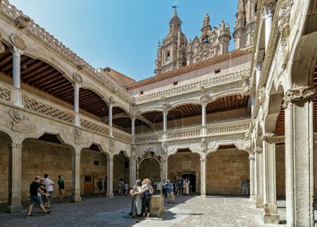 Photo for Salamanca, Spain - August 03, 2019: Towers of the Clerecia (Church of the Clergy) as seen from the Casa de las Conchas (House of Shells) in old town Salamanca, Spain. - Royalty Free Image
