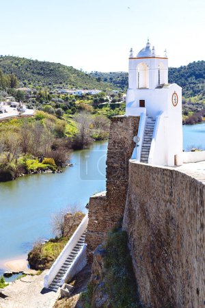 Photo for View to the medieval tower Torre do Relgio in Mertola, Portugal. Colors of Portugal Series - Royalty Free Image