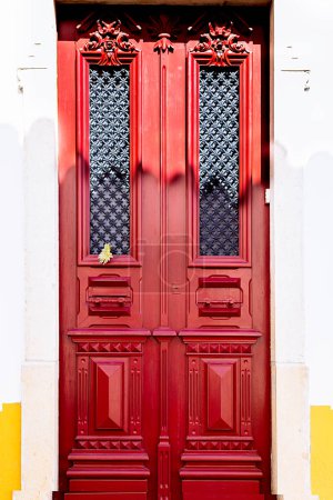 Photo for Antique Red door in Mertola, Portugal. Colors of Portugal Series - Royalty Free Image