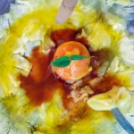 Delicious and refreshing dessert. Orange sorbet on pineapple carpaccio