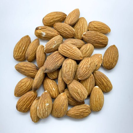 Photo for Dry fruit almonds on a white background. - Royalty Free Image
